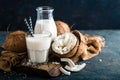 Fresh coconut milk in glass and bottle Royalty Free Stock Photo