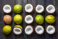 Fresh coconuts arranged tastefully on a wooden backdrop