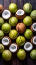 Fresh coconuts arranged tastefully on a wooden backdrop