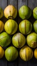 Fresh coconuts arranged tastefully on a wooden backdrop