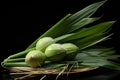 fresh coconuts on a plate with water on a black background