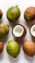 Fresh coconuts presented against a pristine white background