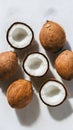 Fresh coconuts presented against a pristine white background