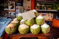 Fresh coconuts for sale on local market in Thailand Royalty Free Stock Photo