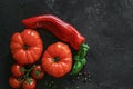 Fresh Coeur de boeuf tomato on a dark background