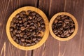 Fresh coffee bean on brown wood Royalty Free Stock Photo