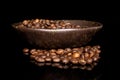 Fresh coffee bean isolated on black glass Royalty Free Stock Photo