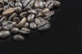 Fresh Coffee Beans Close Up with a Black Background Royalty Free Stock Photo