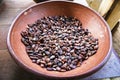 Fresh coffee beans in containers.