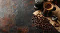 Fresh coffee cup, manual grinder, and roasted beans on dark textured background, creating an artisanal coffee experience with Royalty Free Stock Photo