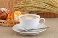 Fresh coffee and the morning bread chou cream. Royalty Free Stock Photo