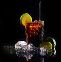 Fresh cola drink with green lime Royalty Free Stock Photo