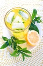 Fresh cold lemonade with mint leaves and lemon. Royalty Free Stock Photo