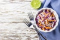 Fresh coleslaw salad made of shredded red and white cabbage and carrots Royalty Free Stock Photo