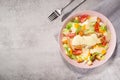 Fresh colored salad ceasar with metal fork Royalty Free Stock Photo