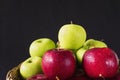 Fresh colorful apple with water drop on skin over gray background Royalty Free Stock Photo