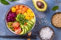 A fresh, colorful poke bowl with a variety of fruits and vegetables, ready to be enjoyed