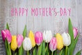 Mother`s Day Card. Colorful tulips on wooden background. Spring Easter Holiday Concept Royalty Free Stock Photo