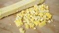Fresh cooked corn is removed from the stem Royalty Free Stock Photo