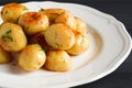 Fresh Cooked, new potatoes,with dill, on a wooden table, selective focus. close-up, toning, no people, Royalty Free Stock Photo