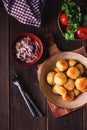 Fresh Cooked, new potatoes,with dill, on a wooden table, selective focus. close-up, toning, no people, Royalty Free Stock Photo