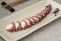 Fresh cooked octopus tentacle in slices