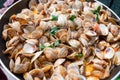 Fresh cooked vongole clams with tomatoes sauce for make of italian seafood dish spaghetti vongole Royalty Free Stock Photo