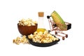 Fresh corn on the cob with bowls of popcorn snack Royalty Free Stock Photo