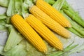 Fresh corn on cobs on rustic wooden table, close up. Sweet corn ears background Royalty Free Stock Photo