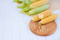 Fresh corn on cobs on rustic wooden table, closeup Royalty Free Stock Photo