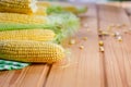 Fresh corn on cobs on rustic wooden table, closeup Royalty Free Stock Photo