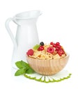 Fresh corn flakes with berries and milk jug Royalty Free Stock Photo