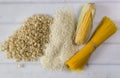 Fresh corncob and rice. gluten free pasta. white background. top view Royalty Free Stock Photo