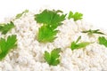 Fresh cottage cheese (curd) heap with parsley, on white