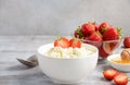 Fresh cottage cheese with fresh strawberries, healthy breakfast concept Royalty Free Stock Photo