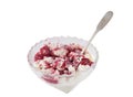 Fresh cottage cheese with strawberry jam in the glass bowl isolated on white background with silver spoon Royalty Free Stock Photo