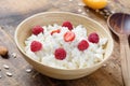 Fresh cottage cheese with raspberries Royalty Free Stock Photo