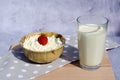 Fresh cottage cheese with strawberries and a glass of milk on a wooden plate. Healthy eating concept. Breakfast. Royalty Free Stock Photo