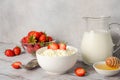 Fresh cottage cheese with fresh strawberries, healthy breakfast concept Royalty Free Stock Photo