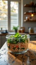 Fresh couscous salad with spinach and vegetables in a glass jar on rustic kitchen counter Royalty Free Stock Photo