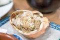 Fresh crab mixed with rice; are grilled on mini strove, in local Japanese restaurant Royalty Free Stock Photo