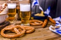 Fresh craft beer. German sausages on the grill. Traditional German sausages and pastry brezel for a beer festival. Wood