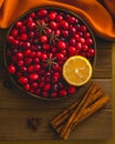 Fresh cranberries, cinnamon, anise, and lemon close up Royalty Free Stock Photo