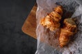 Fresh Croissant Lay on the Cement Table. Breakfast Bakery Light Meal Royalty Free Stock Photo