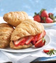 Fresh croissants with strawberry.