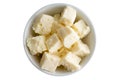 Fresh crumbly traditional feta cheese in a bowl