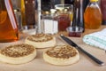 Fresh crumptes on a busy breakfast table with maple syrup Royalty Free Stock Photo