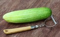 Fresh cucumber with peeler