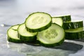 Fresh cucumber slices with droplets close-up. Generative AI Royalty Free Stock Photo