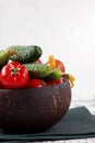Fresh cucumbers and tomatoes in a wooden bowl Royalty Free Stock Photo